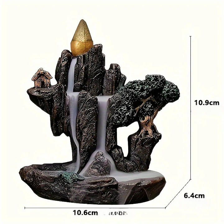 Fontaine décorative en résine représentant une cascade entre des rochers avec un arbre et un petit habitat, format compact pour intérieur.