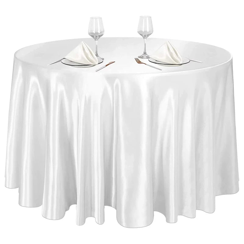 Nappe ronde satinée blanche pour réception, mariage ou événement professionnel.