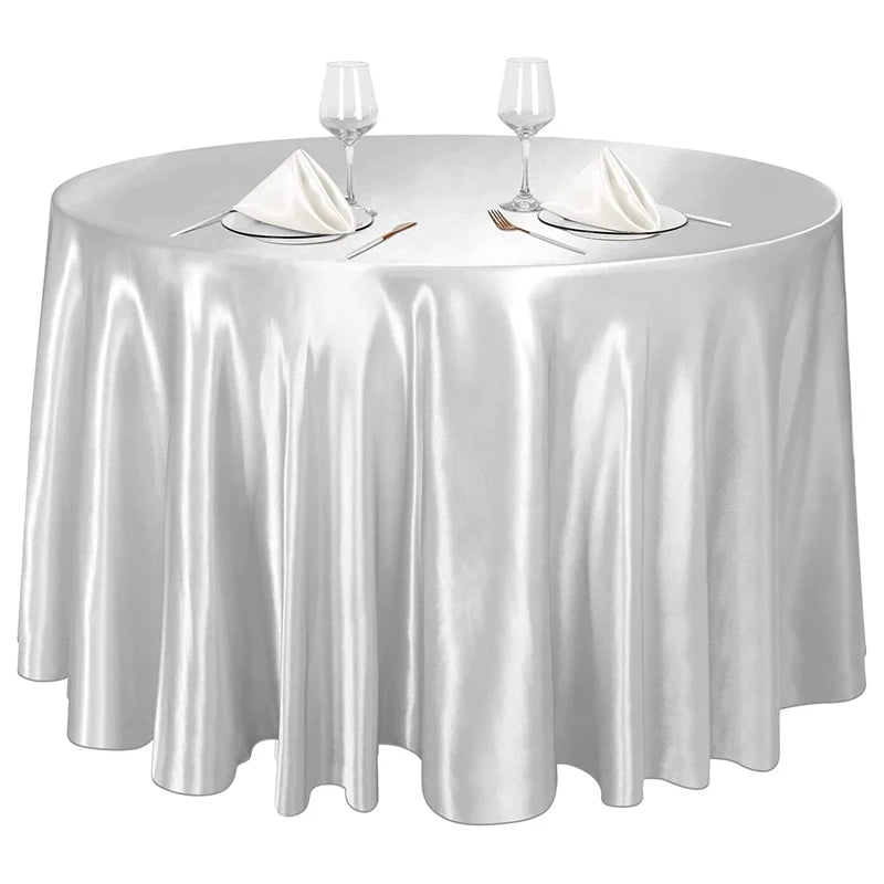 Nappe ronde satinée couleur argent idéale pour événements et tables de cérémonie.