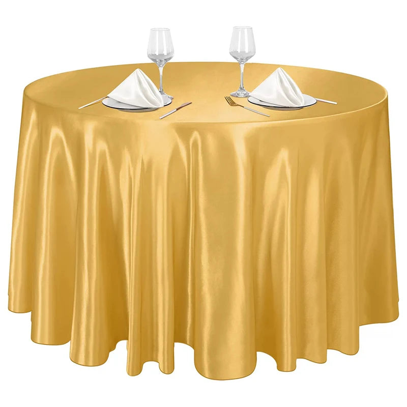 Nappe ronde satinée couleur or pour décoration de table élégante et événementielle.