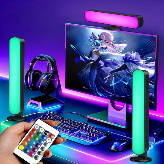 Barres lumineuses LED RGB utilisées pour éclairer un setup gaming avec écran et clavier