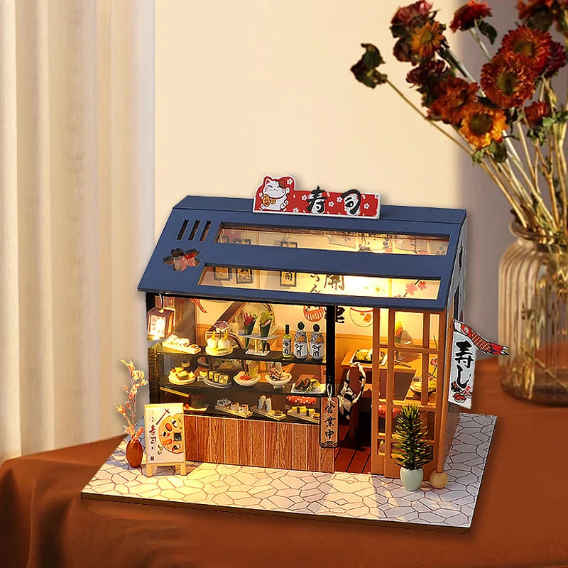 Boutique sushi miniature lumineuse avec vitrine détaillée et enseigne japonaise