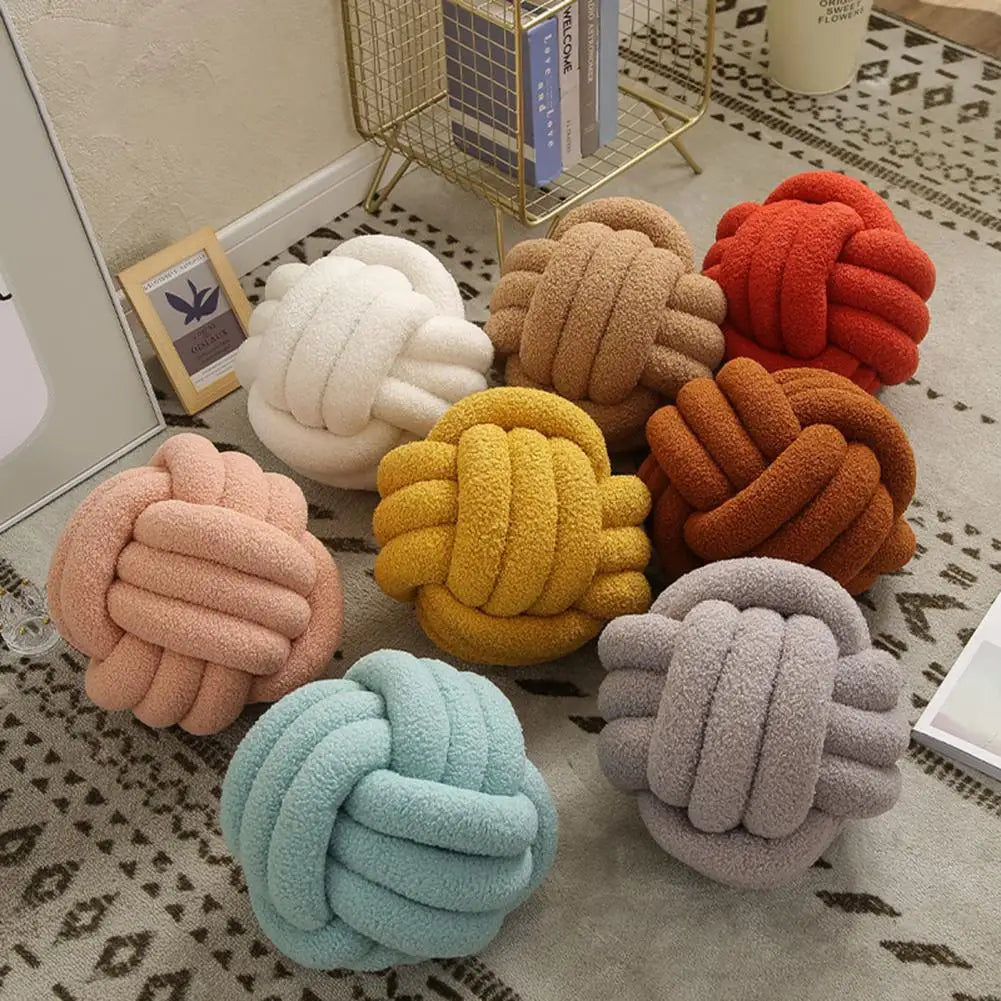 Ensemble de coussins décoratifs boule nouée disponibles en plusieurs couleurs pastel et chaudes