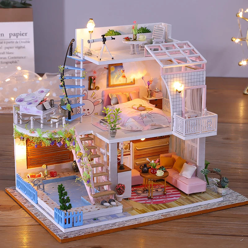 Maison miniature rose à deux étages avec LED intégrées et mobilier intérieur