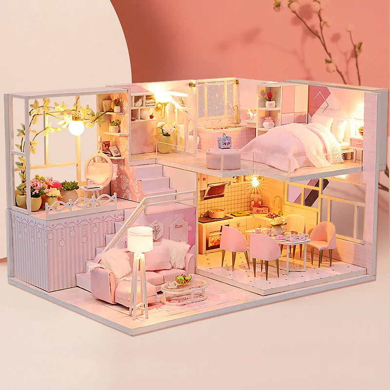 Maison miniature rose lumineuse avec étage, cuisine, salon et chambre détaillés