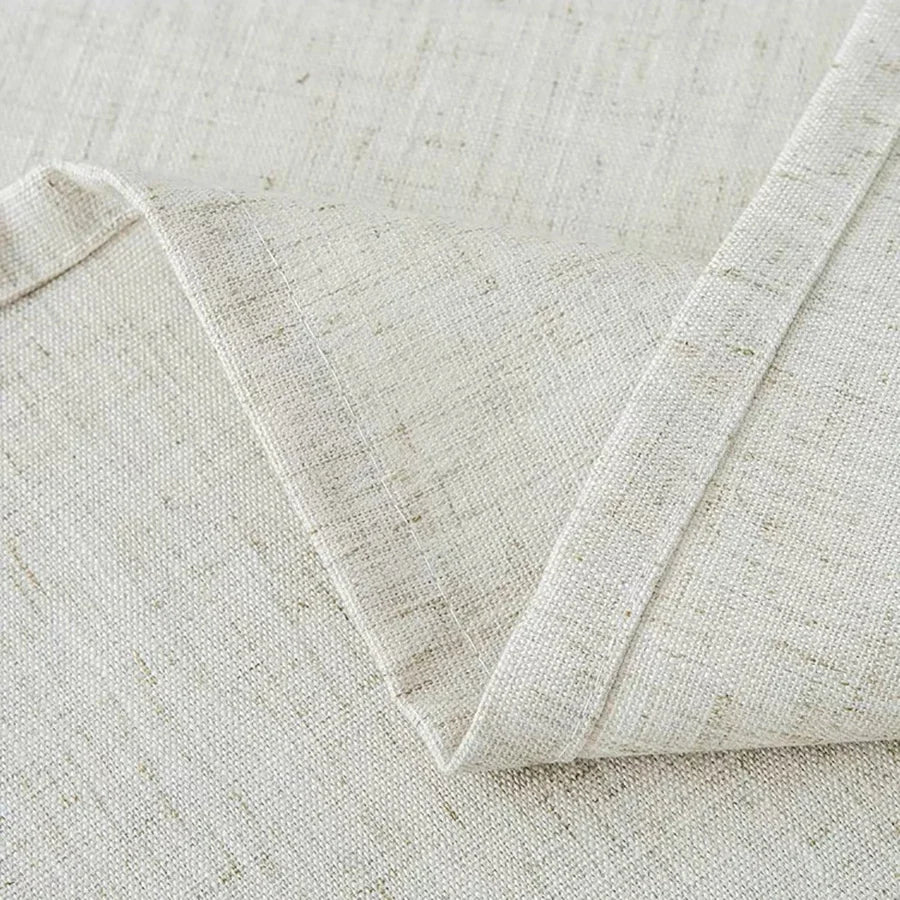 Détail de la texture du tissu effet lin beige naturel avec couture soignée